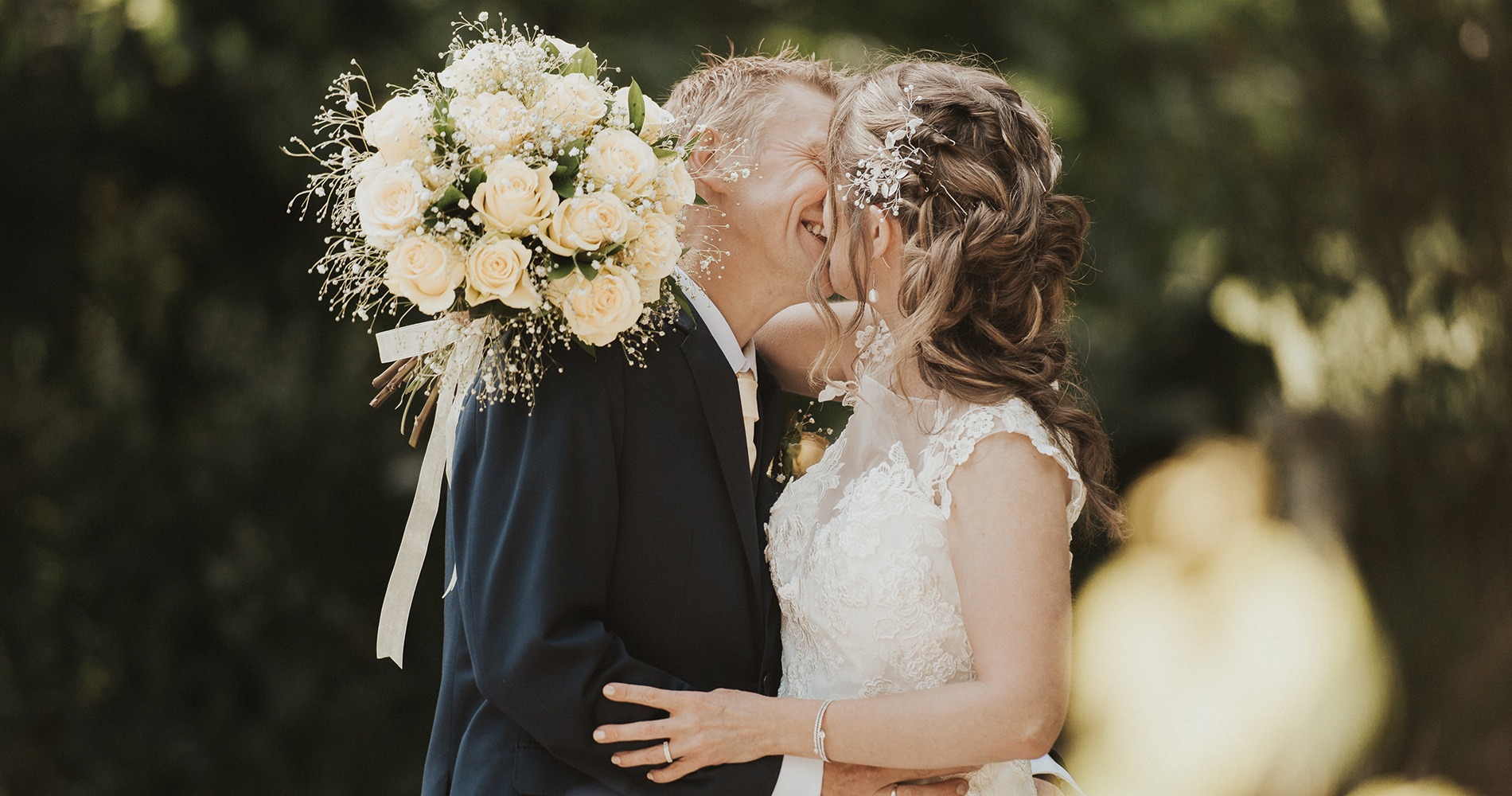 Bride and groom kiss - Wedding Photography by Tracey Allsopp