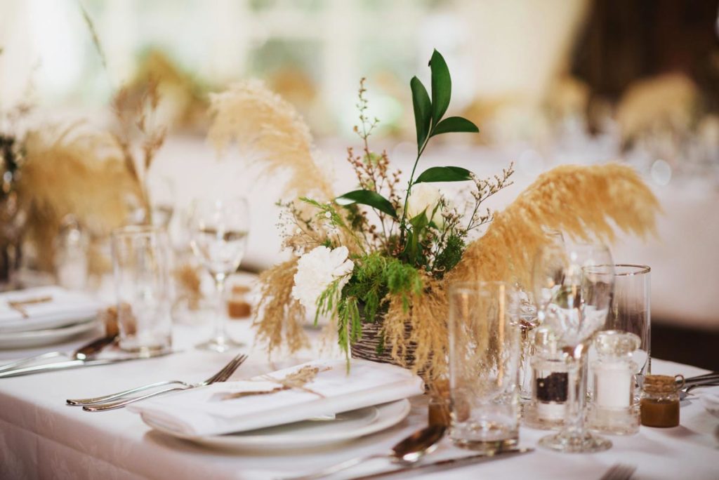 Tables setting at reception. Photo taken by Tracey Allsopp Photography 