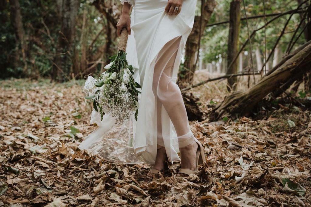 Photo of Bride wearing her shoes. Photo taken by Tracey Allsopp Photography 